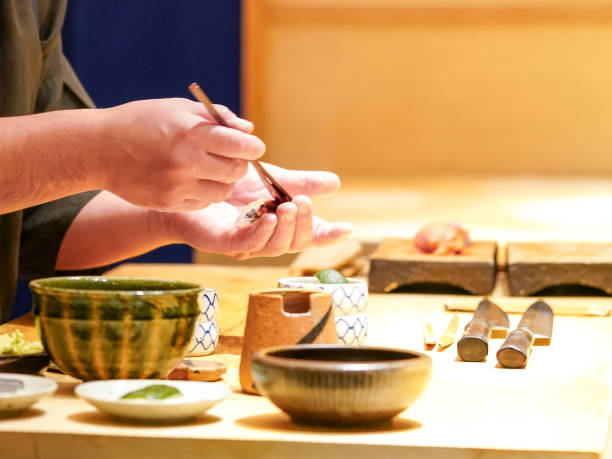 istock The chef is brushing shoyu sauce onto the raw fish. 1256029747