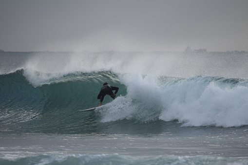 Surfers view looking out of a breaking barrelling wave