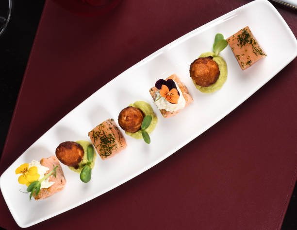 istock Pan-seared scallops, pear and mint puree.Gourmet elegant luxury eating concept fine dining selection 1256032931