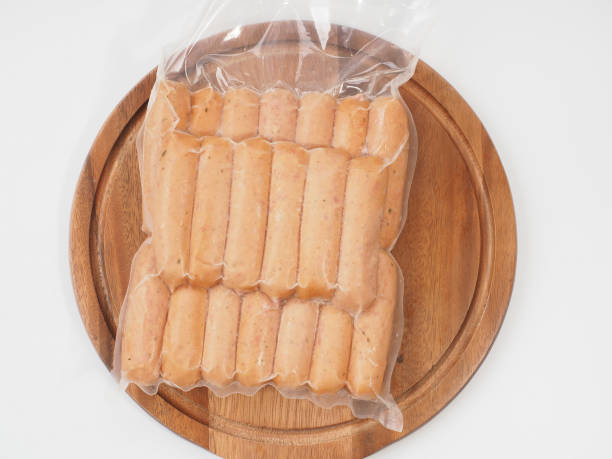 istock Polished Beef sausage in vacuum seal plastic bag on white background. 1256033655
