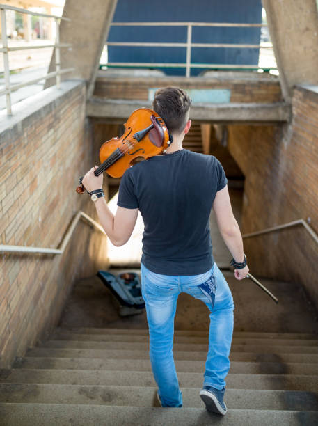 istock Violin street performer 1256047230