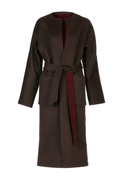 istock Women's elegant brown coat on white background 1256048181