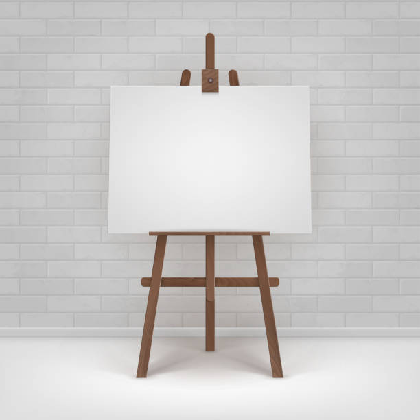 istock Vector Wooden Brown Easel with Mock Up Blank Horizontal Canvas Standing on Floor in front of Brick Wall 1256050192