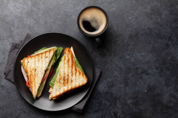 istock Club sandwich and coffee 1256057490