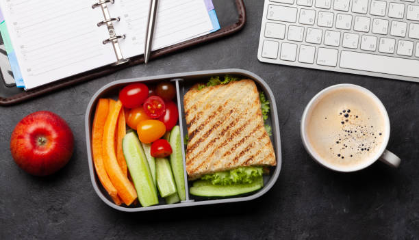istock Healthy lunch box with sandwich and vegetables 1256057901