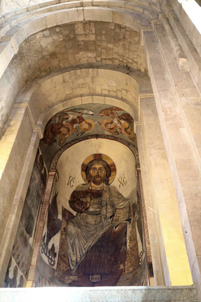 istock Fresco of Jesus Christ on wall 1256059115