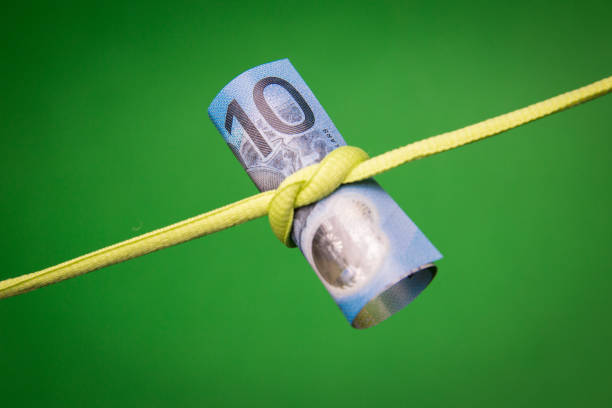 istock Australian Ten Dollar Note Tied in a Knot 1256059197