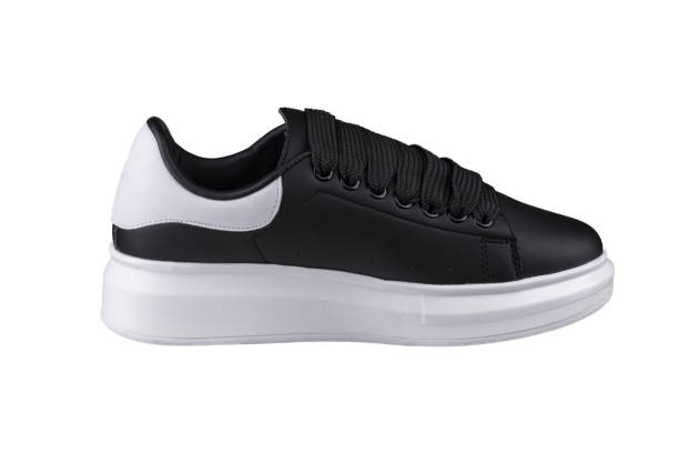istock Black sneaker with white sole. Sport shoes. 1256059264