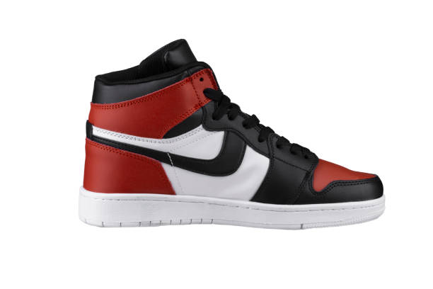 istock Side view of a high sneaker with red and black accents. 1256059314