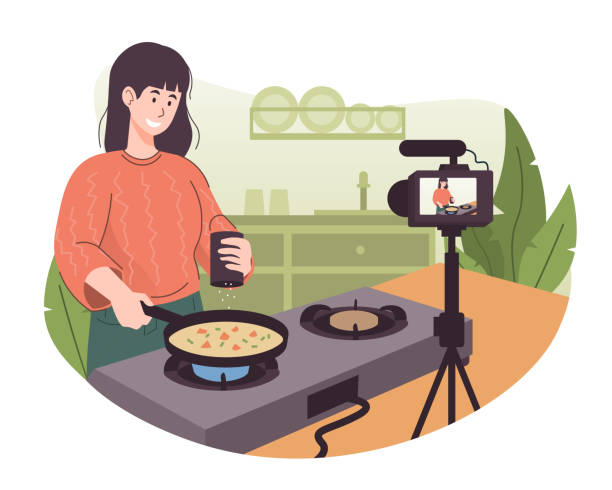 Female Chef Cooking In The Kitchen While Recording Video Using Her Camera  For Her Online Video Channel Food Blogger Preparing Some Food Stock  Illustration - Download Image Now - iStock