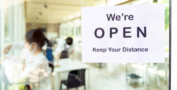 istock New Normal and social distance Restaurant open signage 1256061557