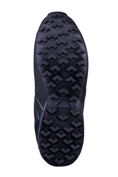 istock Black fluted shoe sole on a white background. 1256062896