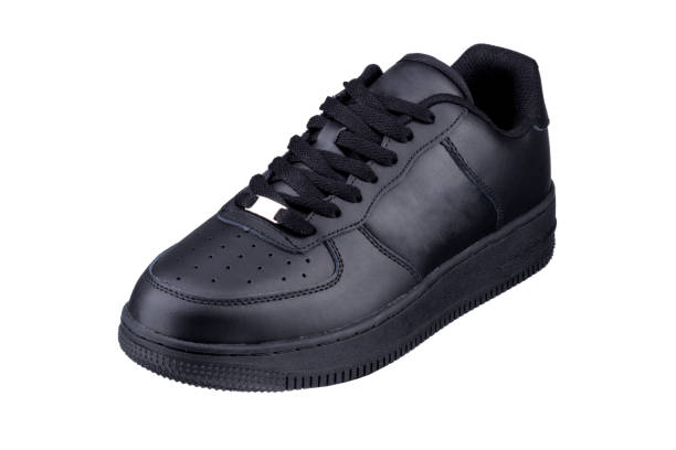 istock One black sneaker on a white background. Sport shoes. 1256062964