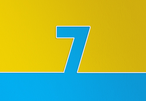Cable and number 7 passing over yellow and blue background. Horizontal composition with copy space.