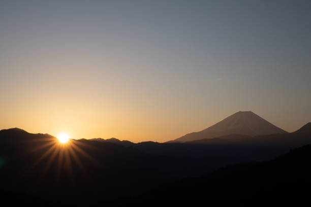 istock Sunrise and silhouette of mount fuji 1256067651