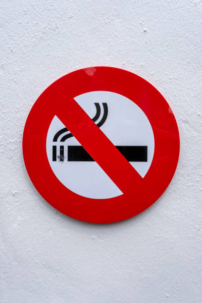istock No Smoking Sign on a Concrete Wall 1256071590