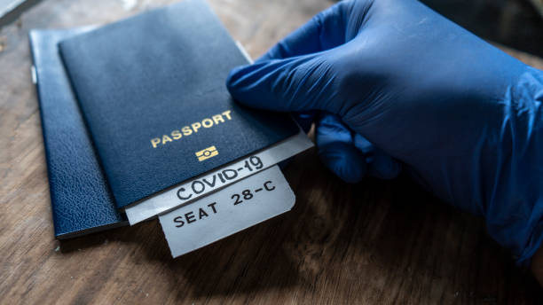 istock Passport with a diagnosis of covid 19 1256072097