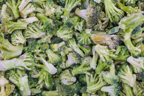istock Frozen broccoli in a supermarket. Top view, background. 1256072950