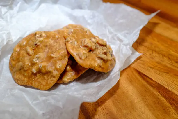 pecan pralines are a popular sweet treat in New Orleans, Louisiana, the recipe of which was brought in by French settlers. They are made of sugar, pecan, and cream