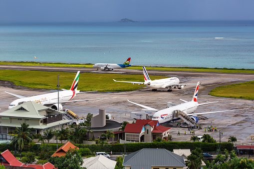 Mahe, Seychelles – February 9, 2020: Airplanes at Mahe airport (SEZ) in the Seychelles.