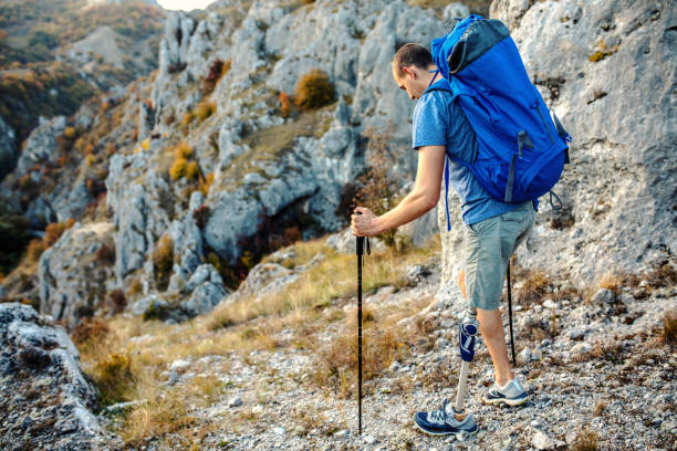 istock Friends hiking in mountains 1256075500