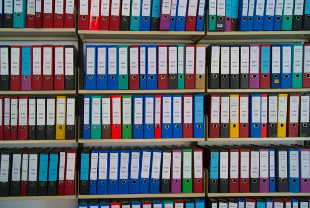 bureaucracy shelf with many files in an office bureaucracy photos stock pictures, royalty-free photos & images