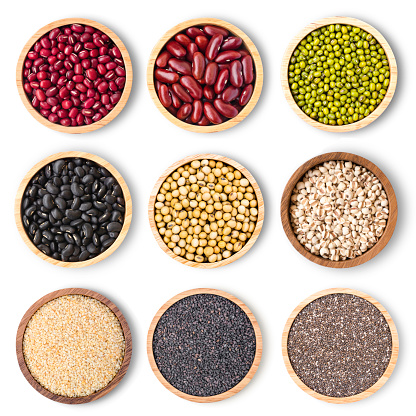 Collection of mix bean ( red kidney, green mung, black bean, soy beans, sesame, chia seed and millet ) in wooden bowl isolated on white background. Top view. Flat lay.