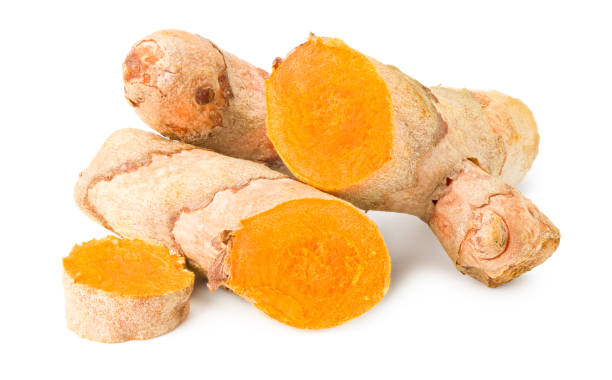 istock Turmeric root with turmeric slices isolated on white background 1256081576