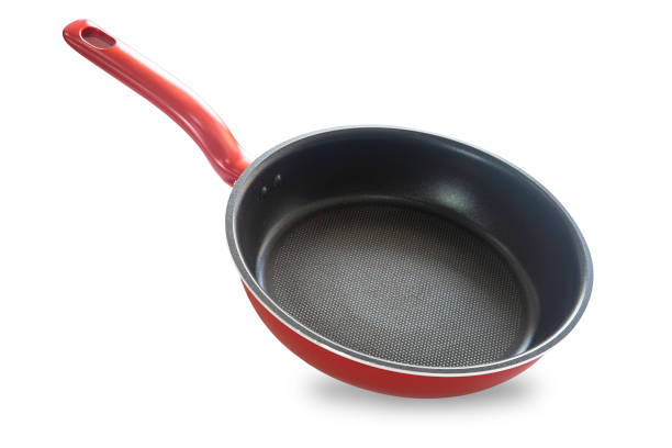 Modern non stick surface frying pan or skillet or sauce pan in red and black color on white isolated background with clipping path. Perfect studio shot cookware and utensils concept for cooking food. Modern non stick surface frying pan or skillet or sauce pan in red and black color on white isolated background with clipping path. Perfect studio shot cookware and utensils concept for cooking food. skillet cooking pan photos stock pictures, royalty-free photos & images