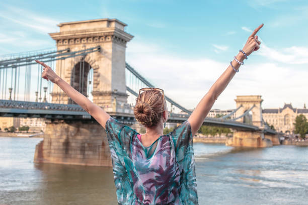 istock Woman arms raised at Budapest, Hungary 1256086062
