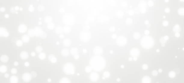 istock 3d render of white bokeh background light blur for template, greeting card design. Abstract wallpaper texture, sparkle pattern for Happy New Year. Winter christmas falling snow on grey background. 1256086240