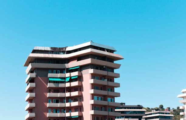 istock Pink and white buildings with a blue sky background (Pesaro, Italy, Europe) 1256087630