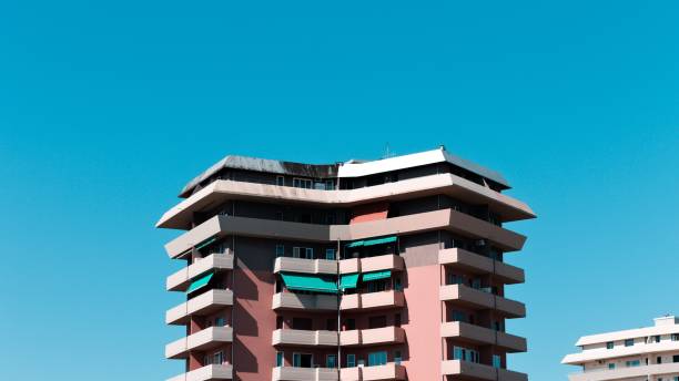 istock Pink and white buildings with a blue sky background (Pesaro, Italy, Europe) 1256087647