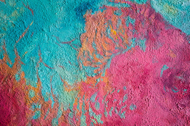 istock painted wall. colors on canvas. Multicolored concrete wallpaper on background 1256087997
