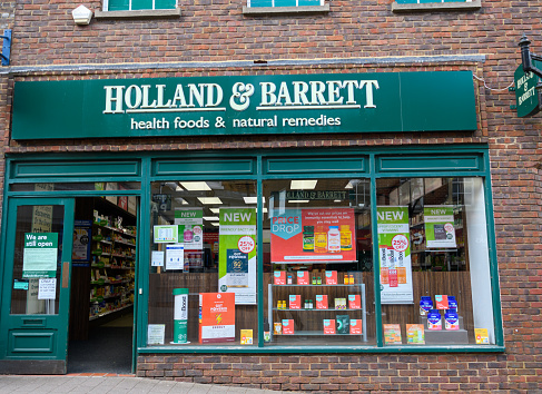 Newbury, United Kingdom - June 09 2020:  The frontage of Holland and Barrett Helath food shop in Northbrook St