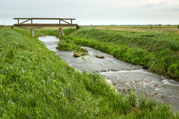 istock Concrete bridge over the Uherka river, eastern Poland 1256091214
