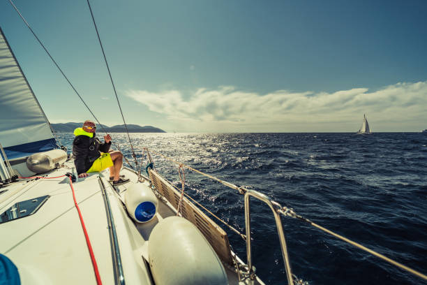 istock adventure man sailing on Aadriatic sea 1256094964