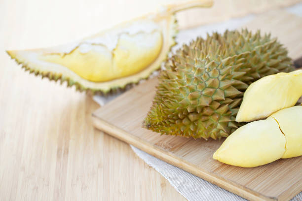 istock Fresh durian fruit on a wooden plate at the restaurant 1256096909