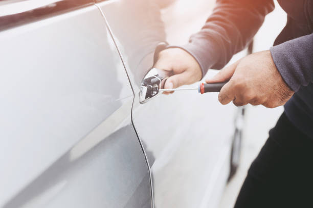 istock The robber is stealing the car parked in the mall. 1256097901