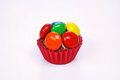 One traditional Brazilian chocolate candy called brigadeiro in m&ms gourmet version