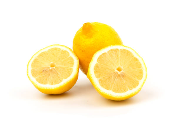 istock Group of lemons in close up, isolated on white background 1256102637