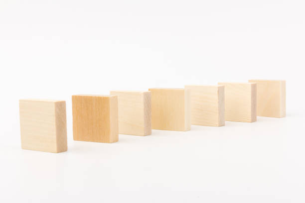 istock Wooden block toy  isolated over white background. space for text 1256102805