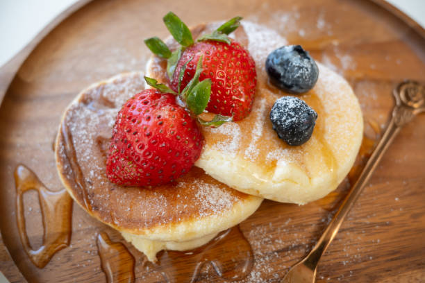 istock Honey pancake with strawberry and blueberry on top 1256102904