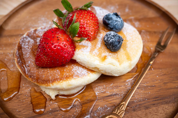 istock Honey pancake with strawberry and blueberry on top 1256102923