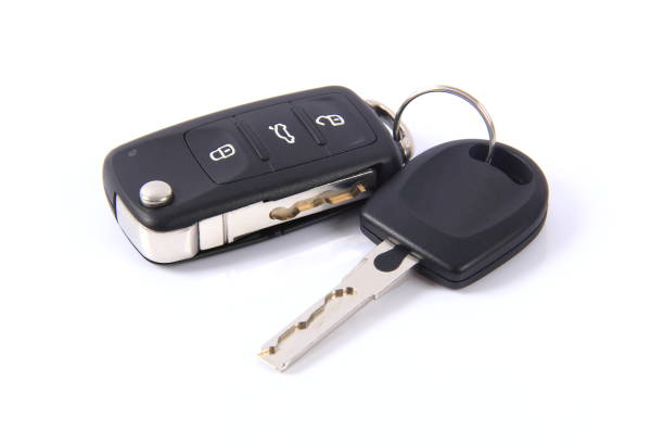Car key on white background Car key on white background key ring photos stock pictures, royalty-free photos & images