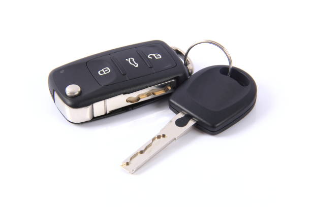 Car key on white background Car key on white background key ring stock pictures, royalty-free photos & images