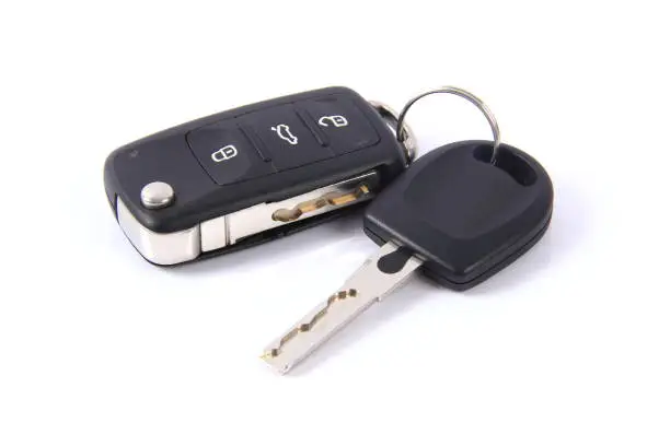 Car key on white background