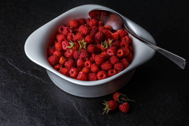cup of raspberry fruits