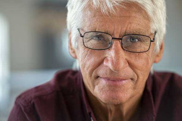 Happy successful retired old man portrait