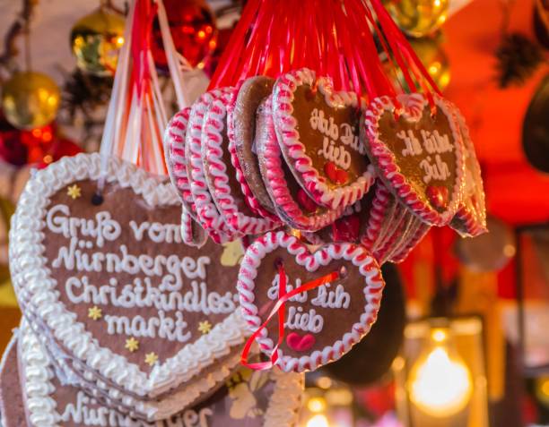 Gingerbread Hearts Christmas Stall Nuremberg German Text "I love you greeting from the Nuremberg Christmas market" I love you Greetings from the Christmas Market of Nuremberg stock photo
